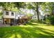 Spacious backyard with lush lawn, deck and patio areas great for outdoor gatherings at 1611 Belmont Sw Ave, Atlanta, GA 30310
