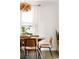 Bright dining room with modern furnishings and stylish pendant lighting at 1611 Belmont Sw Ave, Atlanta, GA 30310