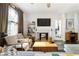 Relaxing living area features hardwood floors, a fireplace, and cozy seating at 1611 Belmont Sw Ave, Atlanta, GA 30310