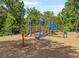This colorful playground features slides, climbing structures and is surrounded by wood chip ground cover at 1611 Belmont Sw Ave, Atlanta, GA 30310