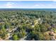 Community aerial showcasing dense tree coverage and sprawling landscape at 5223 Hollyfield Dr, Stone Mountain, GA 30088