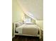 Cozy bedroom with two beds, neutral tones, and a comfortable setting with plenty of natural light at 5223 Hollyfield Dr, Stone Mountain, GA 30088