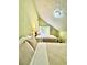 Cozy bedroom with two beds, neutral tones, and a comfortable setting with plenty of natural light at 5223 Hollyfield Dr, Stone Mountain, GA 30088
