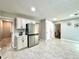 Bright and spacious kitchen with stainless steel appliances, ample storage, and room for dining, perfect for Gathering meals at 5223 Hollyfield Dr, Stone Mountain, GA 30088