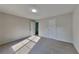 This bedroom features neutral carpet, fresh paint, and abundant light at 1206 Kern Cv, Mcdonough, GA 30253