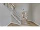 Spacious foyer with a high ceiling and hardwood floors at 1206 Kern Cv, Mcdonough, GA 30253