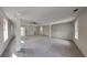 Expansive main bedroom with plush carpet, ceiling fan, and bright windows at 1206 Kern Cv, Mcdonough, GA 30253