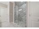 The primary bathroom has a large glass enclosed shower with marble tiling and dual shower heads at 126 Abbington River Ln, Atlanta, GA 30339