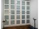 Floor-to-ceiling frosted panel closet doors add to this room's decor while providing ample storage at 126 Abbington River Ln, Atlanta, GA 30339