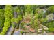 Aerial view of a meticulously designed park area with walking paths and lush landscaping at 126 Abbington River Ln, Atlanta, GA 30339