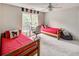 Bright bedroom featuring two twin beds, a desk, and a ceiling fan for comfortable living at 2175 Eagle Trce, Cumming, GA 30040