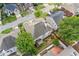 An aerial shot of a home with a large backyard, deck, and mature trees in a suburban neighborhood at 2311 Norbury Se Cv, Smyrna, GA 30080