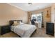 Comfortable bedroom with a work desk, a computer, guitars and ample lighting, ideal for work or study at 2311 Norbury Se Cv, Smyrna, GA 30080