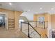 Upstairs hallway boasting views of staircase, open floor plan and natural light creating a welcoming atmosphere at 2311 Norbury Se Cv, Smyrna, GA 30080