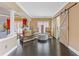 Cozy living space with hardwood floors, barn door, decorative accents, and ample natural light at 2311 Norbury Se Cv, Smyrna, GA 30080