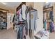 Organized walk-in closet featuring ample storage space and custom shelving for clothing, shoes, and accessories at 2311 Norbury Se Cv, Smyrna, GA 30080