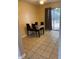 Dining room with sliding glass doors and neutral tile flooring at 3082 Revere Ct, Atlanta, GA 30340