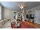 Relaxing living room showcases hardwood floors, comfortable seating, and large windows for plenty of natural light at 733 Frederica Ne St # 2, Atlanta, GA 30306