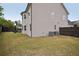 Spacious backyard featuring a fenced-in lawn and an outdoor patio at 2100 Baywood Sw Blvd, Austell, GA 30106