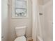 Bright bathroom featuring a combination tub and shower with a neutral-colored shower curtain and walls at 2100 Baywood Sw Blvd, Austell, GA 30106