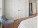 Bedroom showcasing plush carpet, a window with bright light, a chair, and a closet at 2100 Baywood Sw Blvd, Austell, GA 30106