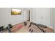 Home exercise room with TV, free weights, and exercise equipment at 2100 Baywood Sw Blvd, Austell, GA 30106
