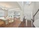 Bright foyer with hardwood floors, staircase, soaring ceilings, and open layout to dining at 2100 Baywood Sw Blvd, Austell, GA 30106