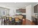 Modern kitchen with granite countertops, stainless steel appliances, and an island with barstool seating at 2100 Baywood Sw Blvd, Austell, GA 30106