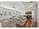 Open-concept living area flows into the kitchen, with hardwood floors and modern decor at 2100 Baywood Sw Blvd, Austell, GA 30106