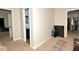 Hallway view into a bathroom showing vanity and mirror with doorways leading to other rooms at 2176 Cold Springs Cir, Lithonia, GA 30058