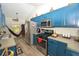 Well-equipped kitchen featuring modern appliances, stylish cabinets, and a cozy nook at 2176 Cold Springs Cir, Lithonia, GA 30058
