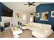 Comfortable living room with a fireplace, plenty of seating, and lots of natural light at 2176 Cold Springs Cir, Lithonia, GA 30058