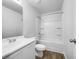 Bathroom featuring a shower over tub and a single sink with plenty of light at 325 Freeman Cir, Villa Rica, GA 30180