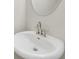 Bathroom features a modern sink and fixtures and a large, decorative mirror at 4142 Spring Valley Cir # 65, Tucker, GA 30084