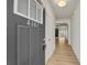 Bright and inviting entryway featuring hardwood floors and open view into the living area at 4142 Spring Valley Cir # 65, Tucker, GA 30084