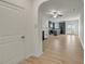 Open-concept living space with wood-look floors and an eat-in kitchen with stainless appliances at 4142 Spring Valley Cir # 65, Tucker, GA 30084
