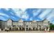 Attractive townhome exteriors showcasing modern architectural details and curb appeal at 546 Sawnee Village Blvd # D71, Cumming, GA 30040