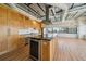 Well-appointed kitchen featuring granite countertops, a stainless steel wine cooler, and an island at 120 Ralph Mcgill Ne Blvd # 1304 & 1305, Atlanta, GA 30308