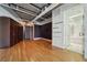 Spacious bedroom with exposed ceilings, hardwood floors, and ample closet space at 120 Ralph Mcgill Ne Blvd # 1304 & 1305, Atlanta, GA 30308