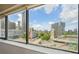 Amazing city skyline views with busy highway and modern buildings seen through a large window at 120 Ralph Mcgill Ne Blvd # 1304 & 1305, Atlanta, GA 30308