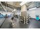 Community gym filled with weight racks, treadmills, and exercise equipment for resident use at 120 Ralph Mcgill Ne Blvd # 1304 & 1305, Atlanta, GA 30308
