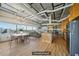 Open living space features modern kitchen, dining area, seating and large windows with great views at 120 Ralph Mcgill Ne Blvd # 1304 & 1305, Atlanta, GA 30308