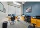 Bright office featuring two desks, large windows, and modern office equipment at 120 Ralph Mcgill Ne Blvd # 1304 & 1305, Atlanta, GA 30308