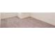 Bedroom featuring neutral carpet and trim and bright natural light at 1567 Aiden Way # 34, Conyers, GA 30013