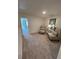 Carpeted bonus room with two chairs and a mirror at 1567 Aiden Way # 34, Conyers, GA 30013