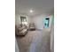 Bonus room featuring two comfortable chairs, table and mirror at 1567 Aiden Way # 34, Conyers, GA 30013