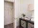 Open closet featuring neutral carpet, white walls, and a wire shelf, next to mirrored console table at 1567 Aiden Way # 34, Conyers, GA 30013