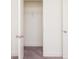 Walk-in closet features neutral carpet, white walls, and a wire shelf at 1567 Aiden Way # 34, Conyers, GA 30013