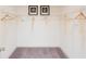 Walk-in closet with shelving and carpet flooring ready for organization at 1567 Aiden Way # 34, Conyers, GA 30013