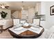 Stylish dining area open to the kitchen, offering a seamless transition for entertaining and Gathering meals at 1567 Aiden Way # 34, Conyers, GA 30013
